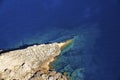 High angle view of rock formation on Mediterranean seaside during sunny day Royalty Free Stock Photo