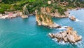 High-angle view of rocks in the sea in Faraglioni of Scopello in Sicily Italy.