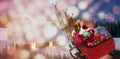 Composite image of high angle view of santa claus riding on sled with gift box Royalty Free Stock Photo