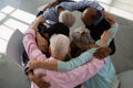 High angle view of senior friends huddling Royalty Free Stock Photo