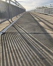 High angle view of shadow on footbridge