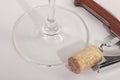 High angle view with shallow depth of field of a glass of red wine with a sommelier tools Royalty Free Stock Photo