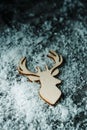 Silhouette of a reindeer head on the snow