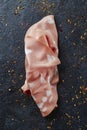high angle view of a slice of mortadella Royalty Free Stock Photo
