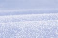 High angle view snow background. Tillable snow texture. Winter background with snow drifts