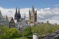 Towers of the Cathedral and great Saint martin church in Cologne, and medieval houses