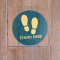 High angle view of standpoint symbol on floor