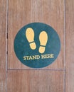 High angle view of standpoint symbol on floor