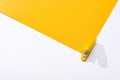 High angle view of stapler and yellow paper on white background. Royalty Free Stock Photo