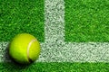 Tennis Ball on Grass Court With Copy Space Royalty Free Stock Photo