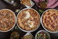 High angle view of traditional Italian food , variety of pizzas