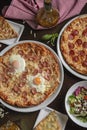 High angle view of traditional Italian food , variety of pizzas