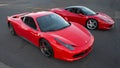 A high angle view of two Ferrari 458 parked.