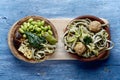 High angle view of two vegan dishes on a table