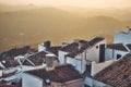High-angle view of typical tiled rooftops and white walls of Spanish town houses in the village of Olvera in the province of Cadiz Royalty Free Stock Photo
