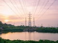 High angle view of high voltage transmission towers with power line over twilight sky background the electricity infrastructure