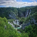 High angle view of the waterfalls with the trees and mountains against sky near Plitvi?ka Jezera, Croatia, May 2019 Royalty Free Stock Photo