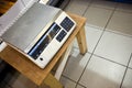 High angle view of weighing machine on stool in supermarket