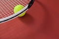 High angle view of white tennis racket with ball