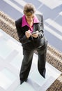 High angle view of woman writing in organizer