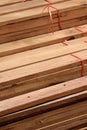 High angle view of wooden planks stack in vertical frame Royalty Free Stock Photo