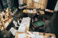 high angle view of young architects playing table football Royalty Free Stock Photo