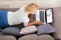 Woman Using Social Networking Site On Laptop Royalty Free Stock Photo