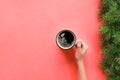 High angle of woman hands holding coffee mug on pink background Minimalistic style. Flat lay, top view isolated Royalty Free Stock Photo