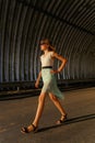 High beautiful teen girl goes through the tunnel Royalty Free Stock Photo