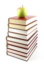 High books pyramid with green apple on top Royalty Free Stock Photo