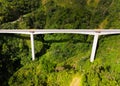 the high bridge among tropical mountains. Agas Agas bridge Royalty Free Stock Photo