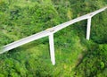 the high bridge among tropical mountains. Agas Agas bridge Royalty Free Stock Photo