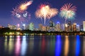 High building of city view reflections with fireworks