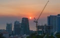 High building and crane under construction .sunset for background Royalty Free Stock Photo