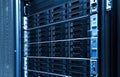 High capacity hard drive disk storage rack used for big data cloud services inside data server room close up Royalty Free Stock Photo