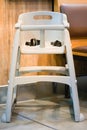 high chair seat for sit eating position for kids in fast food.use baby chair seat for safe cute child in cafe breakfast.high chair