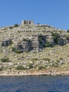 High cliff in Kornati islands Croatia with castle