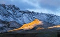 High cliffs during sunset. Dolomite Alps, Italy. Mountains and clear skies. View of mountains and cliffs. Natural mountain scenery Royalty Free Stock Photo