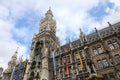 High clock tower of the new town hall of Munich in Germany and t Royalty Free Stock Photo