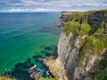 High coastal cliffs on the Antrim Coast, near Giant`s Causeway, Northern Ireland. Royalty Free Stock Photo