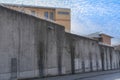 high concrete fence, barbed wire fence on top, pre-trial detention cell, building for execution of punishments for criminals, Royalty Free Stock Photo