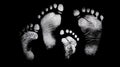 high contras white footprints isolated on black background Royalty Free Stock Photo