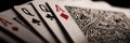 High-contrast Close-Up of Poker Cards Showing Queens and Aces in a Dramatic Setting Royalty Free Stock Photo