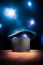 High contrast image of magician hat on a stage Royalty Free Stock Photo