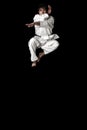 High Contrast karate young male fighter jump