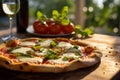 a fresh Margherita Pizza on a rustic table, with a vineyard in golden sunset light.
