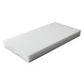 A high density rectangular white foam block isolated on a clean white background for studio use Royalty Free Stock Photo