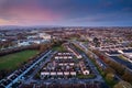 High density residential area in Galway city, Ireland. Sunset sky and warm and cold colors. Aerial view. Town houses in close Royalty Free Stock Photo