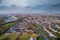 High density residential area in Galway city, Ireland. Sunset sky and warm and cold colors. Aerial view. Town houses in close Royalty Free Stock Photo