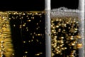 High detail of one flute of champagne with golden bubbles